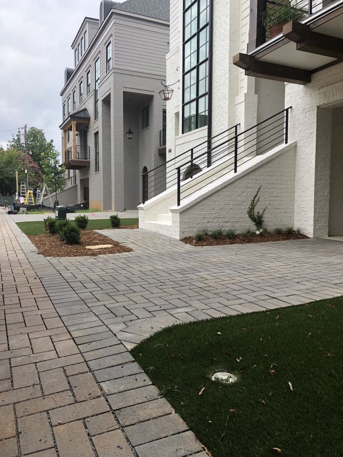 The towers at Mattie Rose Pavers Driveway